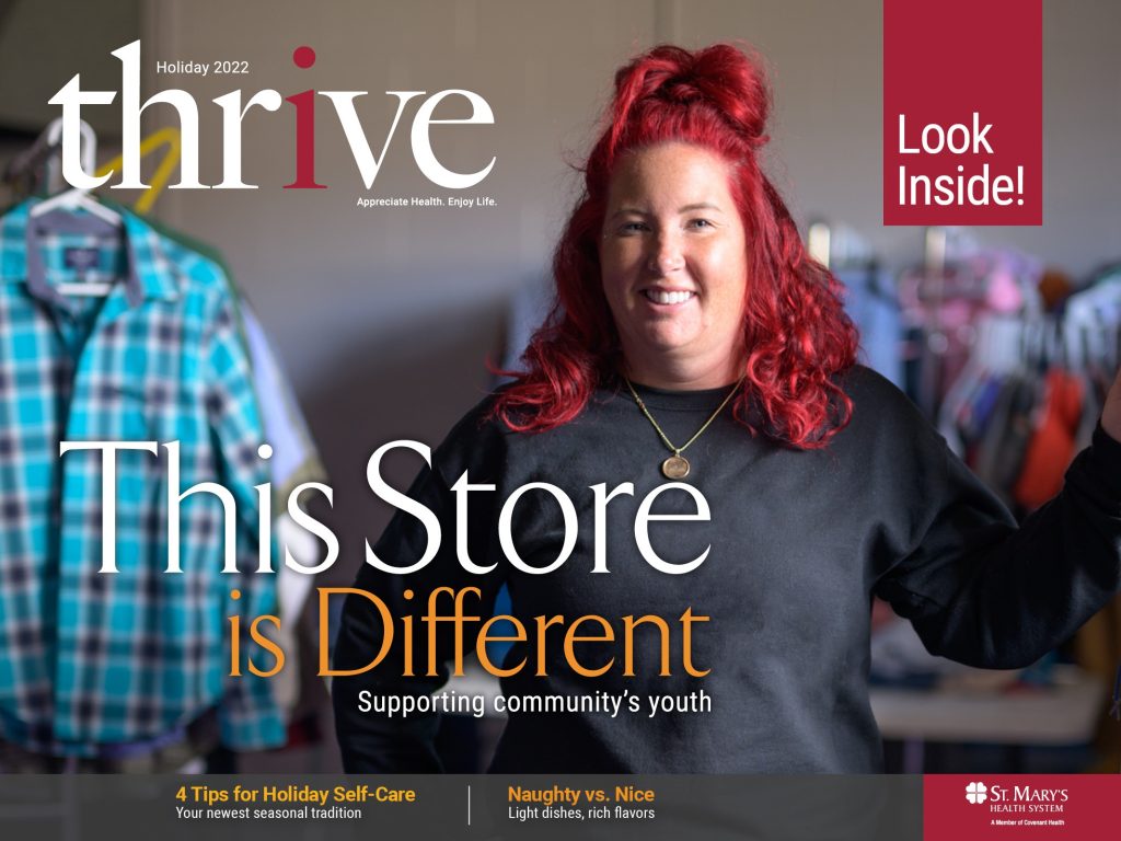 Cover of digital magazine, thrive, with a woman who has red hair at "The Store Next Door."